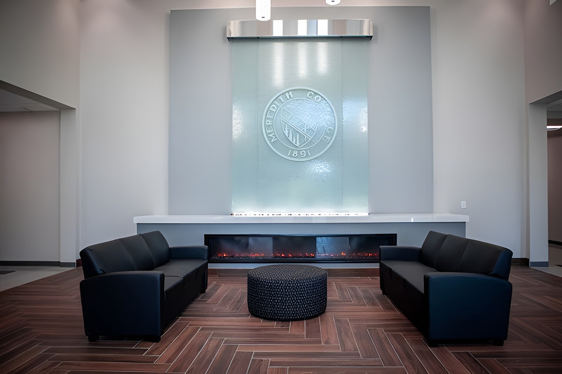 CHESS Building lobby with water feature and fireplace - Meredith College